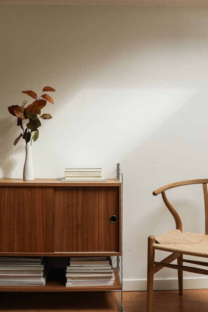 Brown Wooden Chair Beside Brown Wooden Cabinet